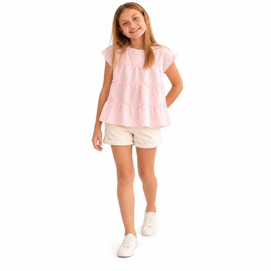 Blusa Lino Alfo rosa con rayas blancas, presentada por modelo sobre fondo blanco.